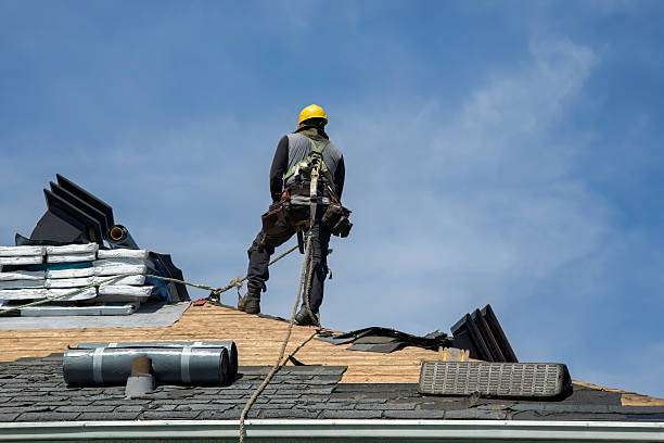 Professional Gutter Installation technician working in East Hampstead, NH